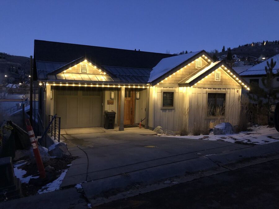 A clean roofline outline at blue hour
